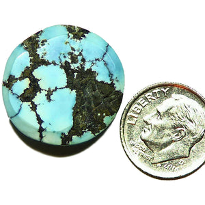 Unstabilized Lone Mountain Turquoise cabochon from Nevada