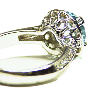 Platinum and diamond ring set with natural Aquamarine