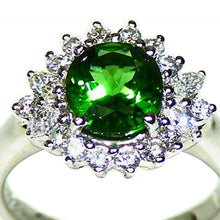 Load image into Gallery viewer, Gorgeous Tsavorite garnet with twinkling diamond halo platinum engagement ring 
