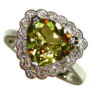 Natural color change Zultanite gold ring with diamond halo