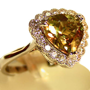 Color change Zultanite ring with diamond accents